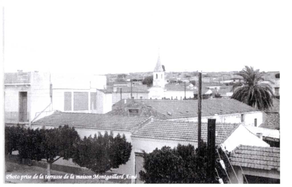 ASSI BOU NIF PAR DESSUS LES TOITS.JPG